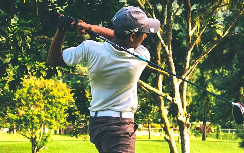 Man playing golf